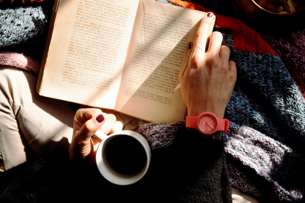 a person reading one of the best horror books 